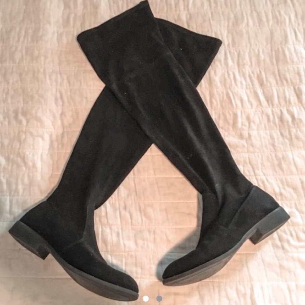 thigh high black boots !